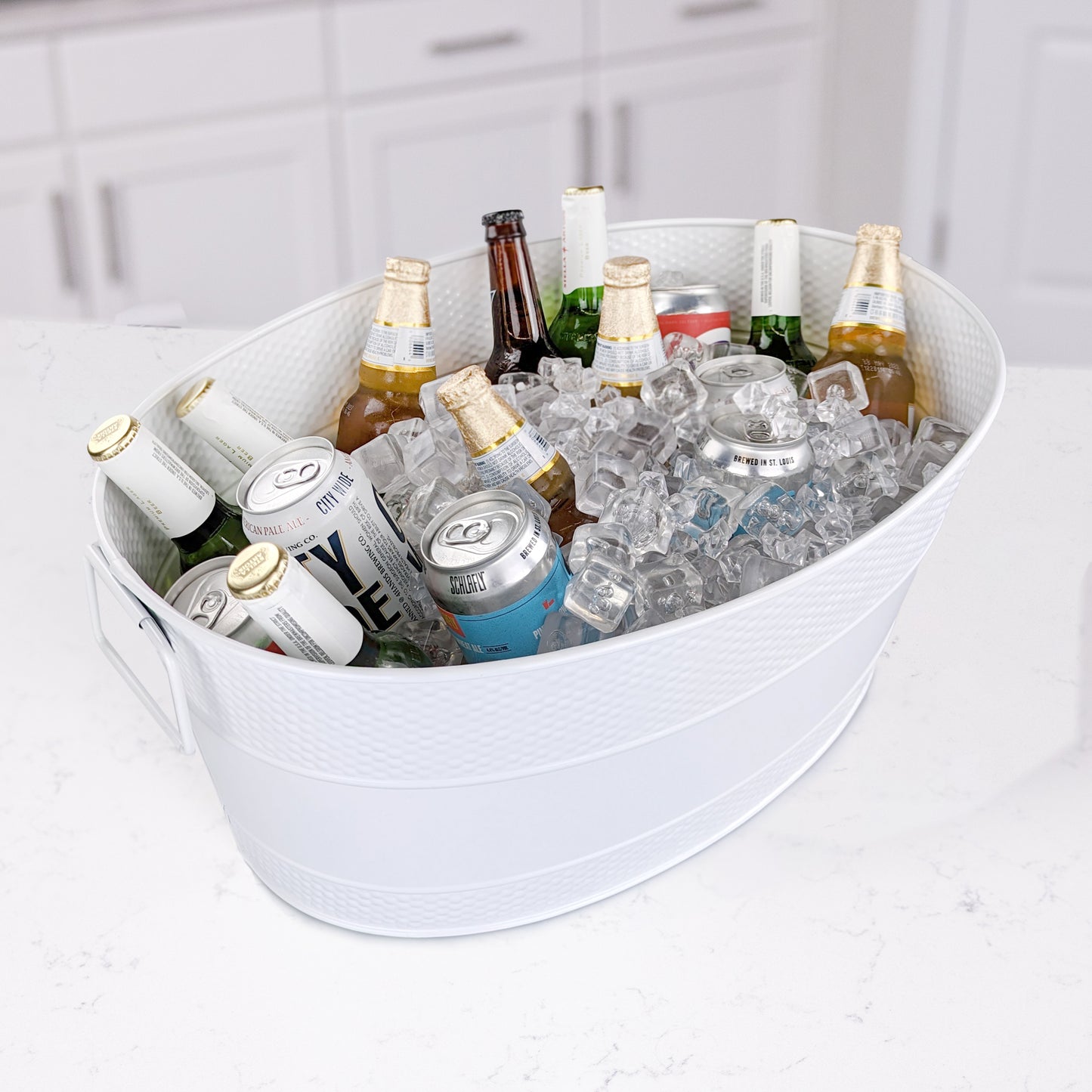 Oval metal party tub to chill drinks at a party with friends, celebrating a wedding, anniversary, bridal shower, or other holiday.