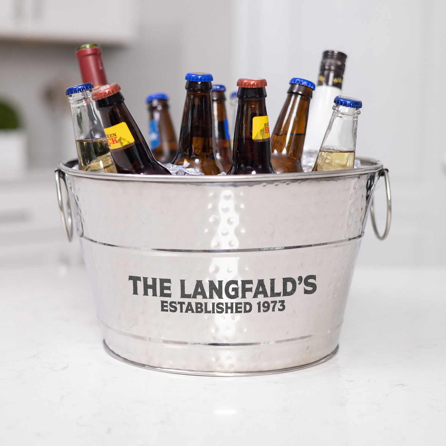 Personalized ice bucket drink cooler for wedding, anniversary, or housewarming gift.  Wine bucket made of premium stainless steel that is leak resistant and keeps drink cold.