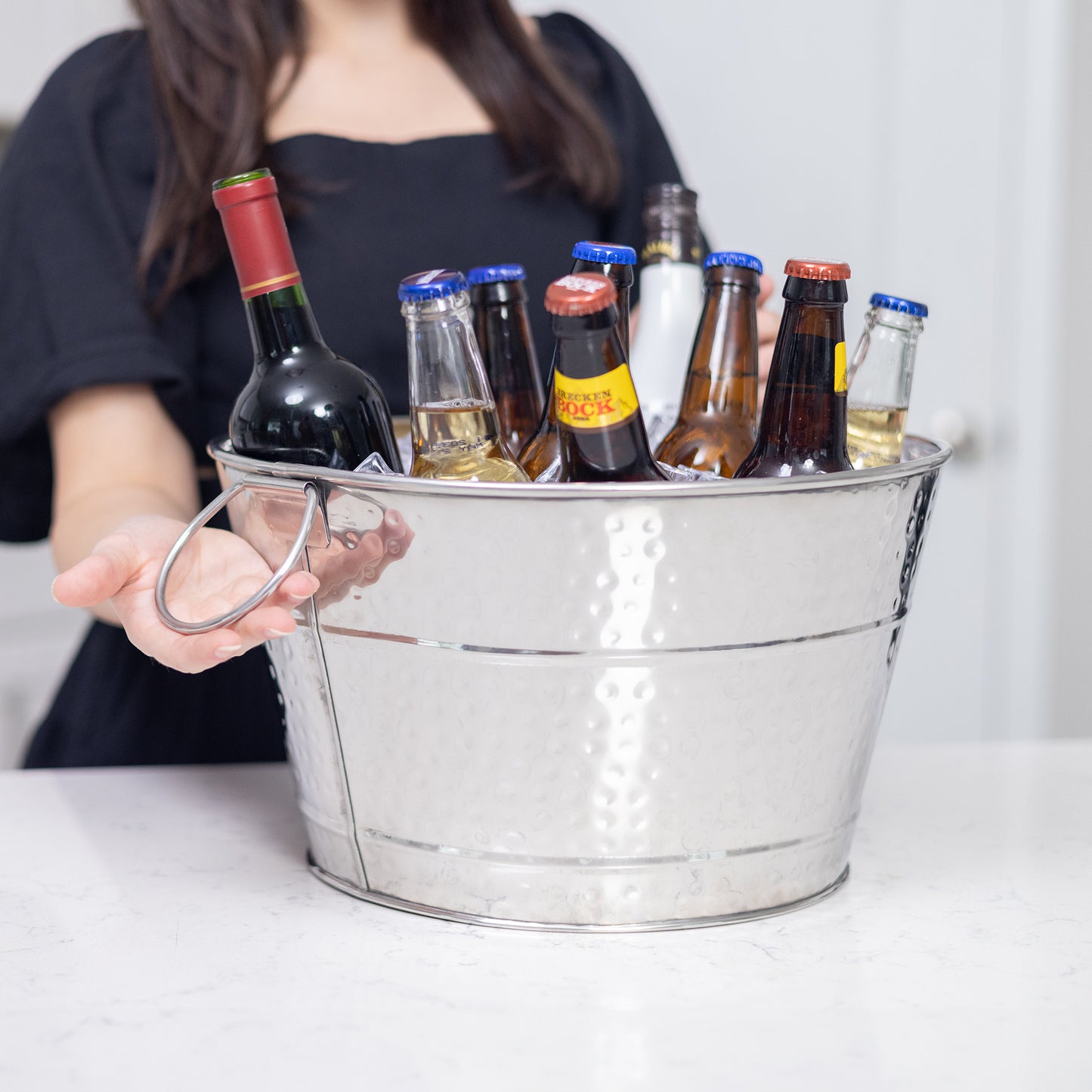 Versatile metal drink bucket perfect for use as an ice bucket for cocktail bar, on the patio, or use in a restaurant, club, or other event space. Adaptable for any occasion.