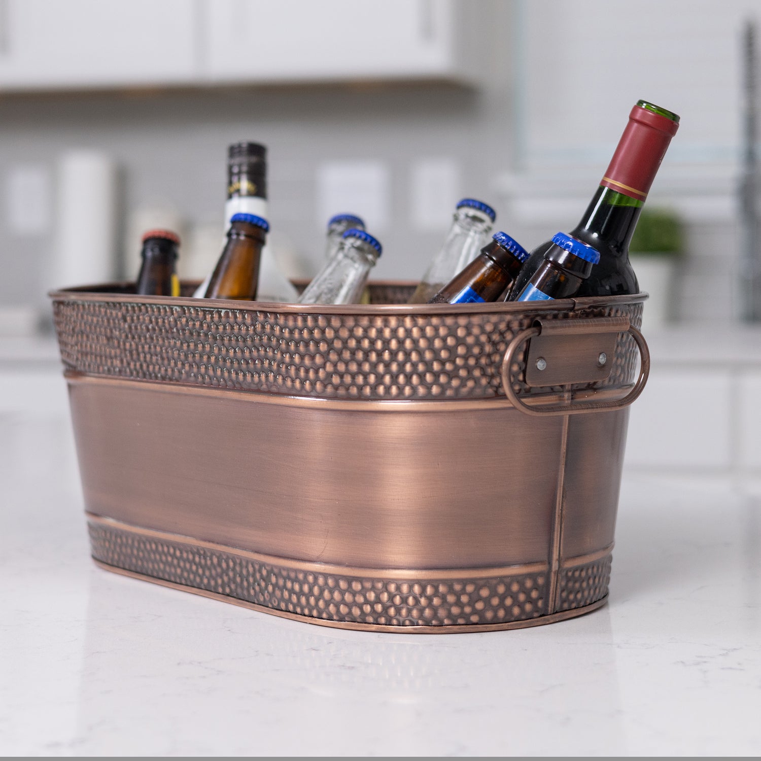 Copper tub for drinks with hammered exterior and easy to clean glossy finish.