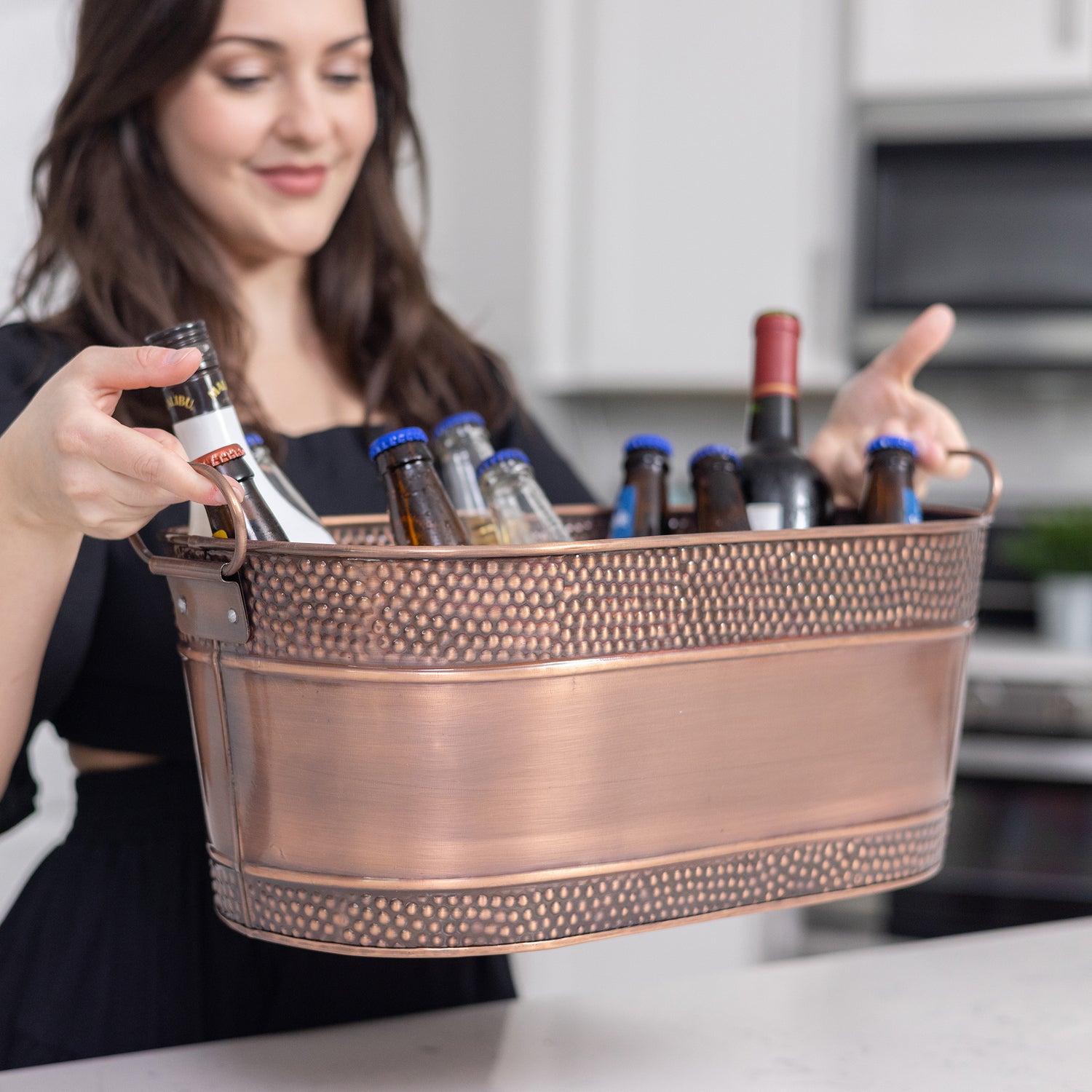 Oval copper drink tub to chill drinks for parties.  Keep wine, beer, and other drinks cold for hours.  Great to use when celebrating a holiday or housewarming part.