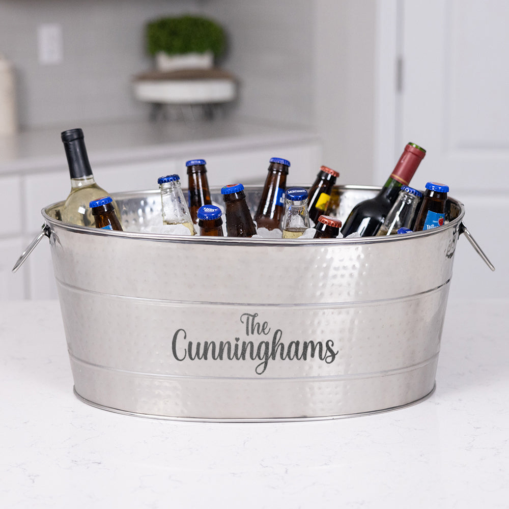 Personalized metal ice drink cooler for beer wine water and other drinks at parties celebrating with friends and family for a wedding anniversary birthday or holiday part.  Great for housewarming, wedding, or anniversary gift.