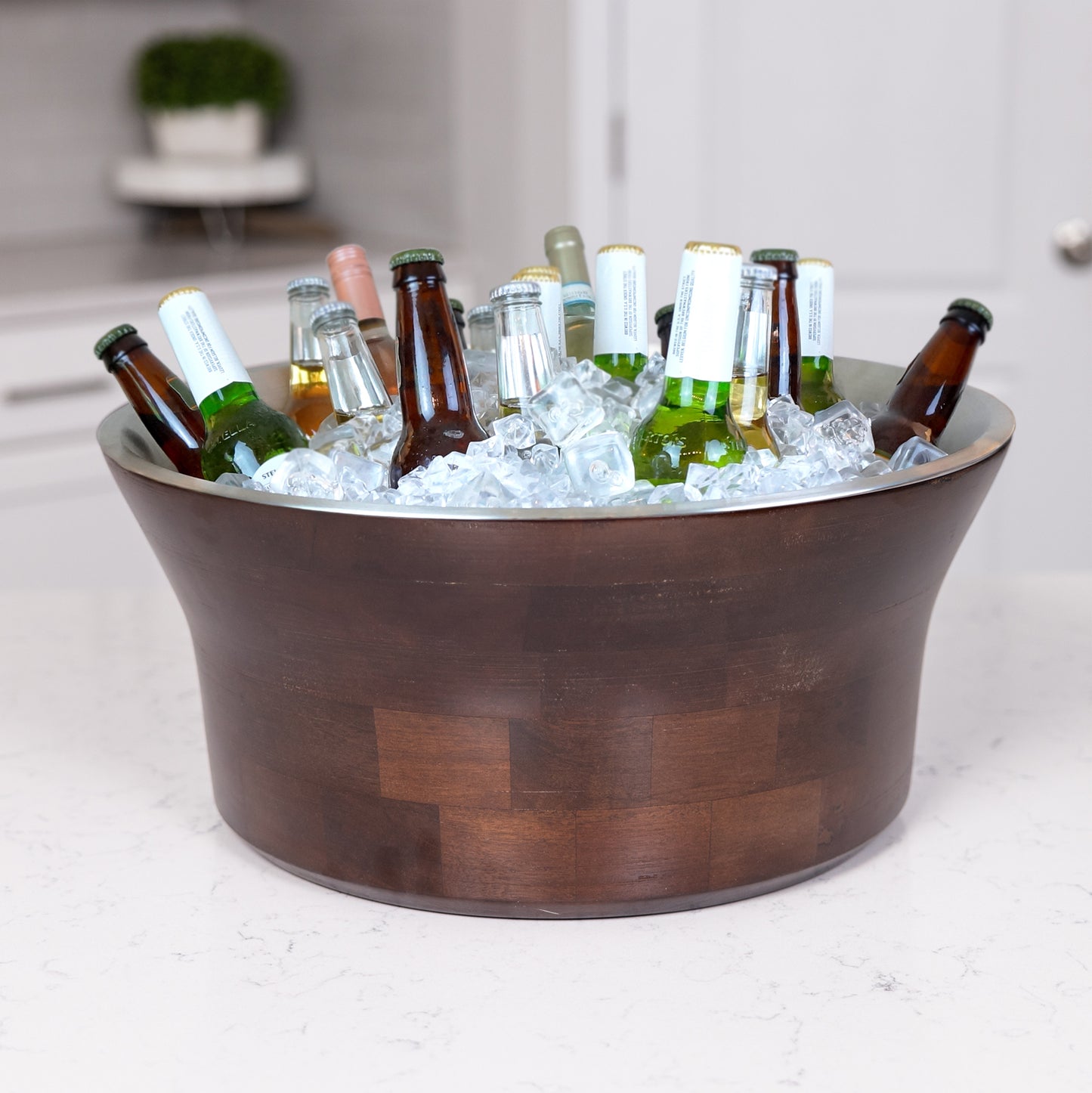 Large leak proof party tub with inner stainless steel wall and outer mango wood wall.  Great for wedding, anniversary, birthday, and holiday party use.  Serve wine, champagne, beer, and other drinks to your party guests.  Keeps drinks chilled for hours.