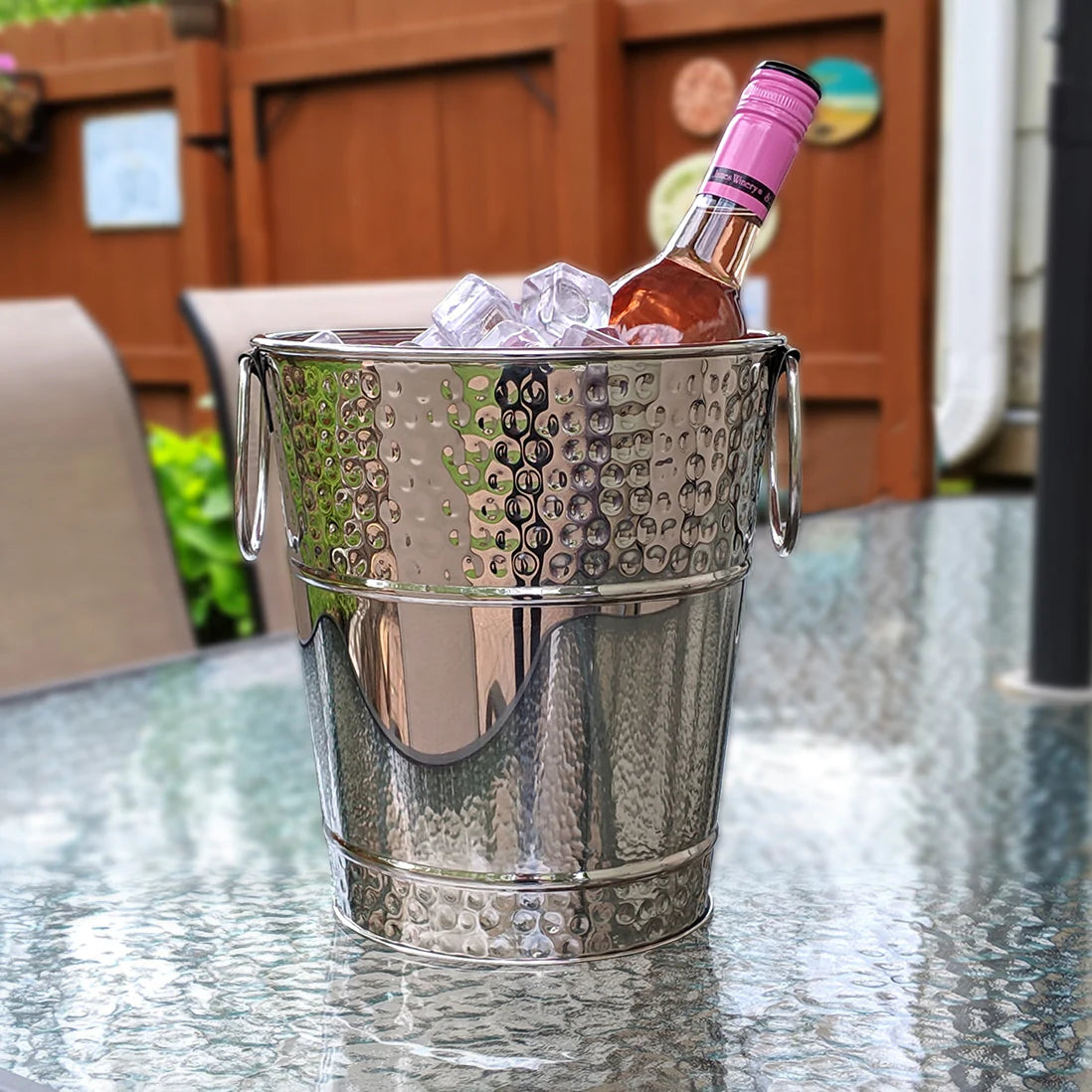 Wine bucket for parties on the patio.  Chill wine or champagne and use in the kitchen, dining room, or bar as well.  Made of hammered stainless steel.  Celebrate weddings, anniversary, birthday, or holidays.